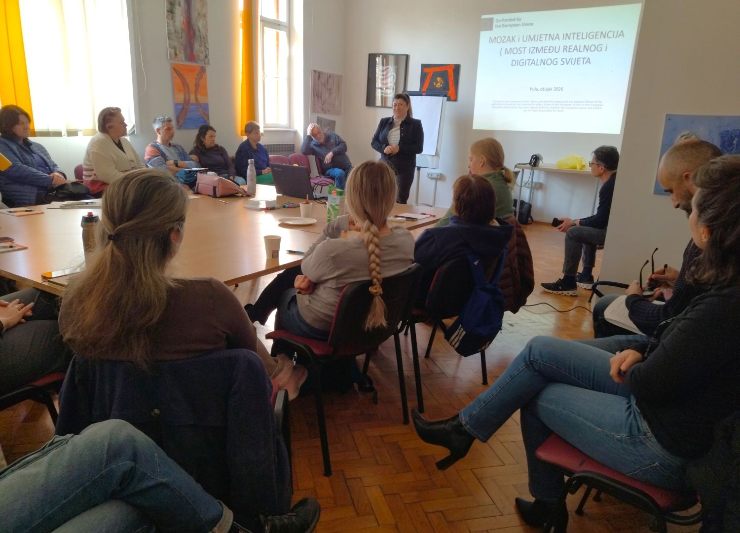 NGO employees during an active discussion about AI application in vocational rehabilitation for people with disabilities